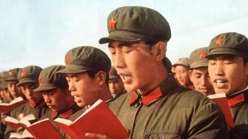 Communist propapanda: China's Red Army soldiers read from Mao Zedong's 'Little Red Book'