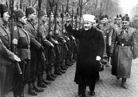 Husseini saluting the Bosnian Muslim division of the Waffen SS in 1943