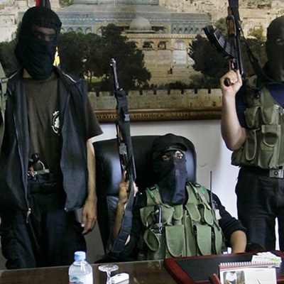 Hamas fighters in the offices of the PNA in Gaza