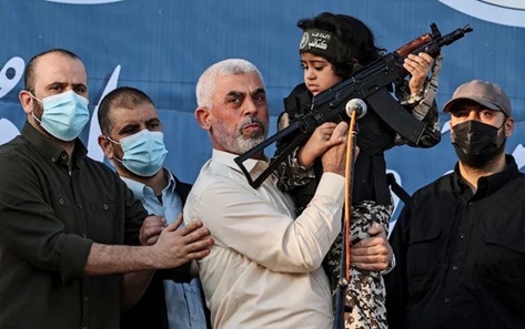 Yahya Sinwar with sacrificial child 